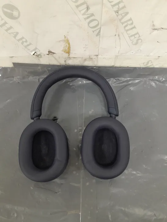 BAGGED NAVY SONY HEADPHONES - NO ACCESSORIES 