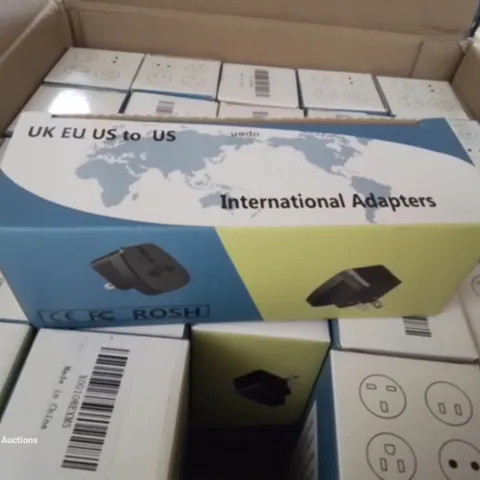 A BOX OF 35 INTERNATIONAL ADAPTER PLUGS 