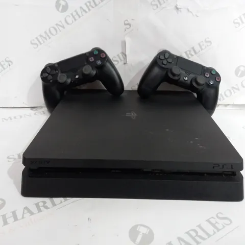 PLAYSTATION 4 CONSOLE IN BLACK WITH 2 CONTROLLERS