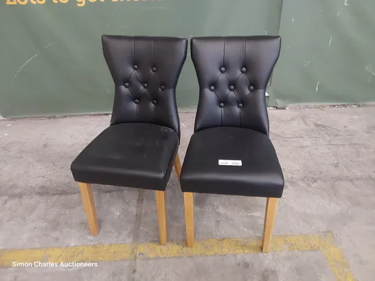 PAIR OF UPHOLSTERED BUTTONED BACK DINING CHAIRS BLACK PU ON NATURAL WOOD LEGS 