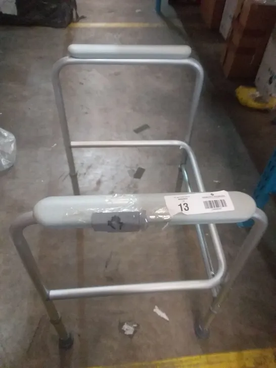 HEIGHT ADJUSTABLE WALKING FRAME