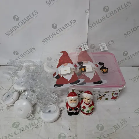 BOX OF 4 CHRISTMAS THEMED DECORATIVE ITEMS TO INCLUDE HOME REFLECTION WINDOW LIGHT DOTS, SANTA EXPRESS SET OF 2 WINDOW STRICKERS AND MR & MRS CLAUS SALT & PEPPER SHAKERS ETC