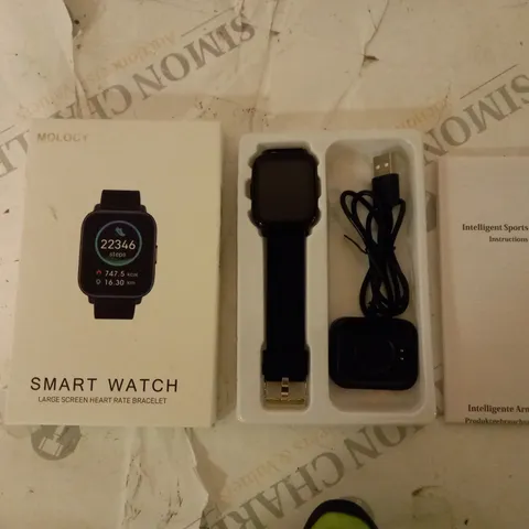 BOXED MOLOGY SMART WATCH WITH CHARGING DOCK AND MANUAL