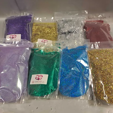 BOX OF APPROXIMATELY 15 SEALED ASSORTED GLITTER POUCHES TO INCLUDE - PURPLE - GOLD - RED - ETC - COLLECTION ONLY