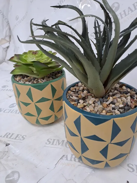 2 X FAUX POTTED PLANTS 