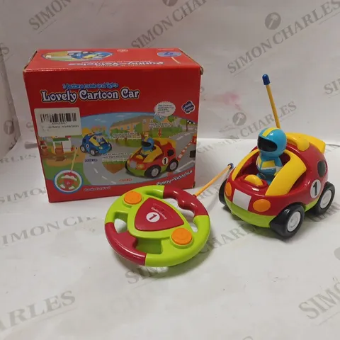 BOXED RADIO CONTROLLED CARTOON CAR WITH THREE BUTTONS, MUSIC AND LIGHTS