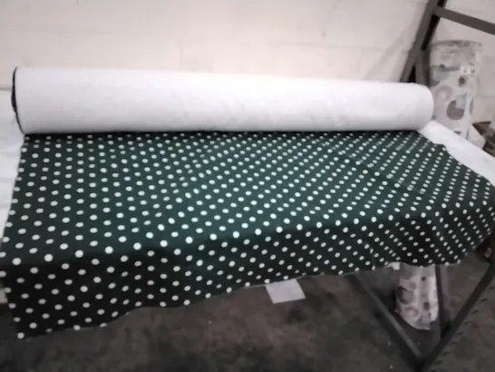 ROLL OF GREEN DOTTED FABRIC SIZE UNSPECIFIED 