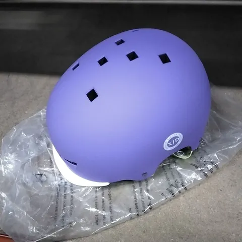 A BOX OF 11 CHILDREN'S HELMETS IN PURPLE