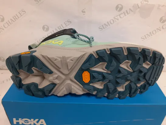 BOXED PAIR OF HOKA WOMENS TRAIL CODE GORE-TEX BOOTS IN LIGHT BLUE/GREEN/GREY - UK 9.5