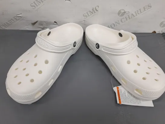 PAIR OF CROCS CLASSICS IN WHITE UK SIZE M9/W10