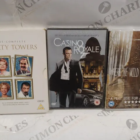 BOX OF APPROXIMATELY 15 ASSORTED DVDS TO INCLUDE THE COMPLETE FAULTY TOWERS, CASINO ROYALE, WHERE THE WILD THINGS ARE, ETC