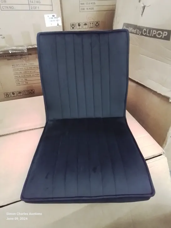 A BOXED SET OF 4 VELVET UPHOLSTERED DINING ROOM CHAIRS IN BLACK