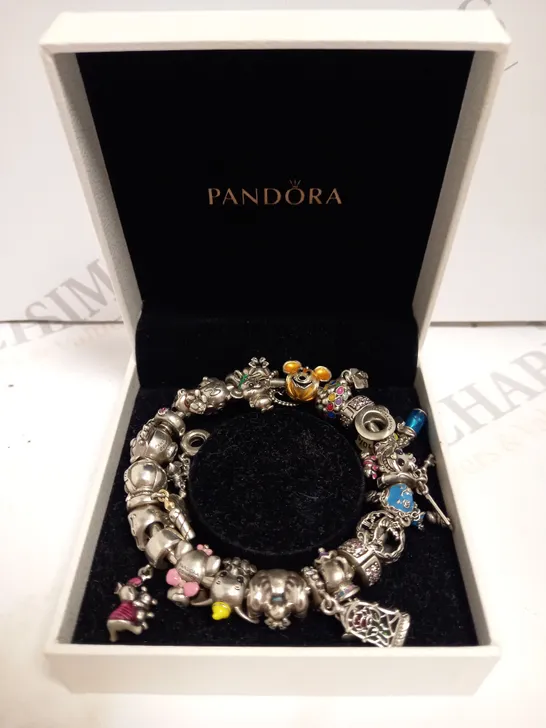 BOXED PANDORA DISNEY CHARM BRACELET WITH ASSORTED CHARMS INCLUDING WINNIE THE POOH, STAR WARS AND DUMBO