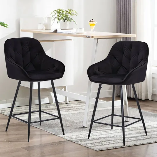 A BOXED PAIR OF BLACK VELVET UPHOLSTERED DINING CHAIRS