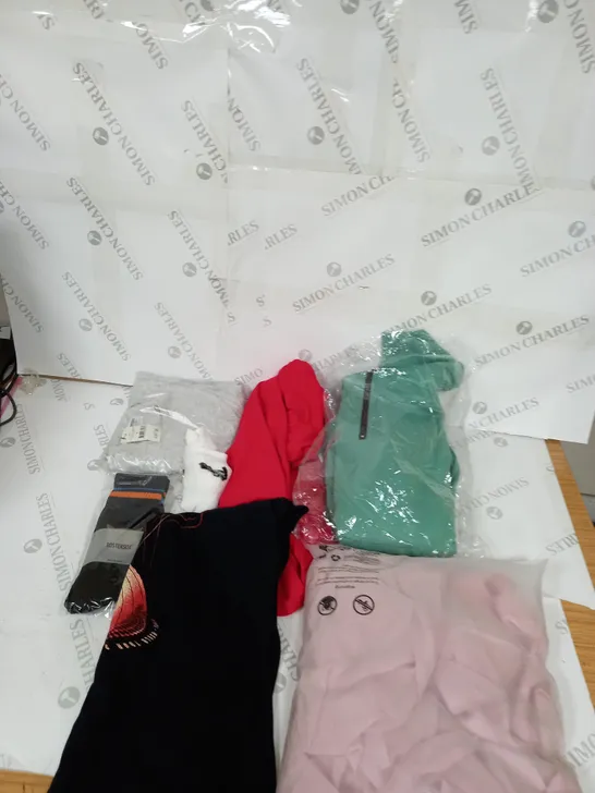 LARGE BOX OF ASSORTED CLOTHING ITEMS IN VARIOUS COLOURS AND SIZES INCLUDING TROUSERS , TOPS AND JUMPERS 