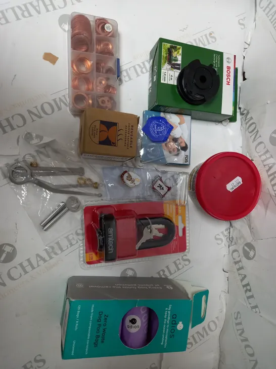 BOX OF ASSSORTED ITEMS TO INCLUDE - REUSABLE COFFEE CAPSULE /AMTECH PAD LOCK/ ADIOS DOG POO BAGS 