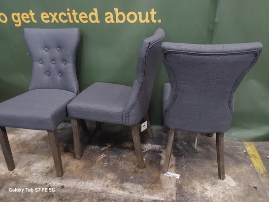 SET OF THREE BUTTONED BACK UPHOLSTERED DINING CHAIRS CHARCOAL FABRIC ON SILVERED LEGS 