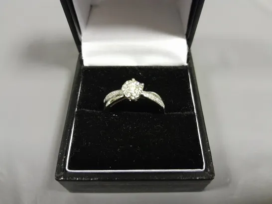 9CT WHITE GOLD RING WITH NATURAL DIAMOND HALO AND TWIST SHOULDERS