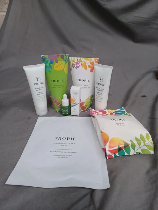 LOT OF 8 TROPIC SKIN CARE PRODUCTS TO INCLUDE BODY WASH, FACE SHEET MASK AND A BAMBOO CLOTH