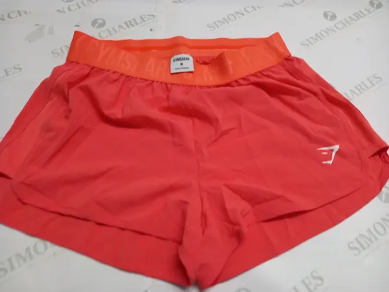 GYMSHARK ORANGE TRAINING SHORTS - M