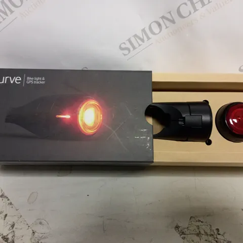 BOXED CURVE BICYCLE LIGHT & GPS TRACKER 