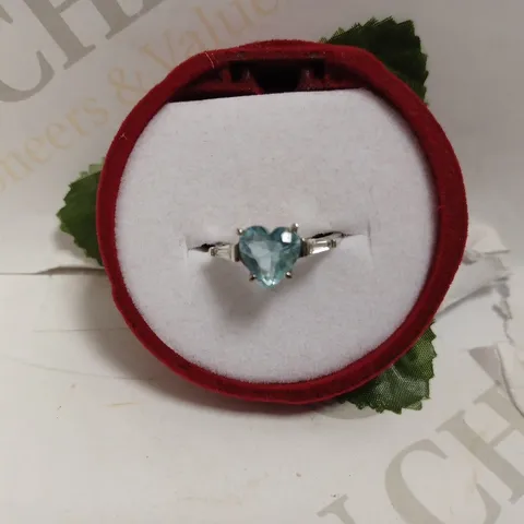 SILVER LOOP RING WITH BLUE HEART CUT STONE