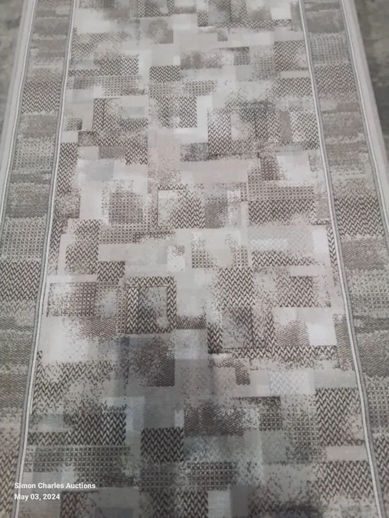 A RUG FROM RUNRUG COMPANY IN TRIBE BEIGE DESIGN L4.8X100