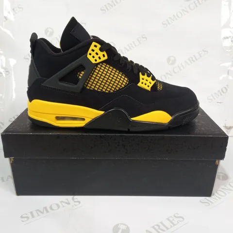 BOXED PAIR OF NIKE AIR JORDAN 4 RETRO SHOES IN BLACK/YELLOW UK SIZE 8