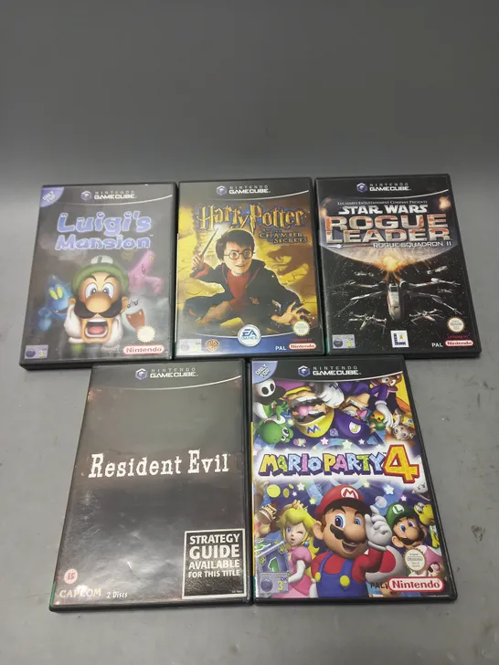 LOT OF 5 NINTENDO GAMECUBE GAMES TO INCLUDE LUIGIS MANSION, MARIO PARTY 4 AND STAR WARS ROGUE LEADER ETC