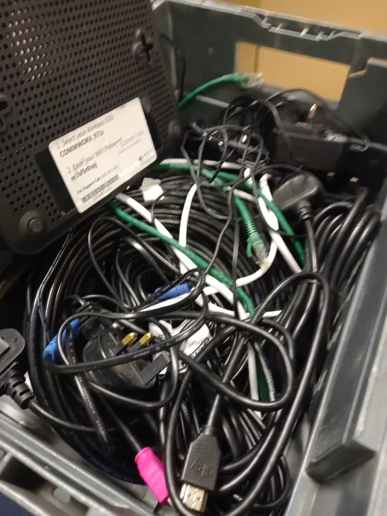 ASSORTMENT OF CABLES AND WIRES PLUS A COMMWORX ROUTER 