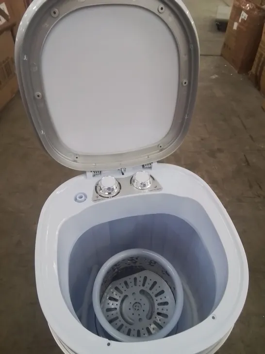 A BOXED PORTABLE MINI WASHING MACHINE AND SPIN DRYER SYSTEM 