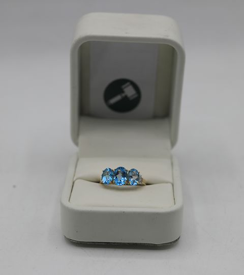 DESIGNER 9CT GOLD RING SET WITH THREE OVAL BLUE TOPAZ WITH DIAMOND ACCENTS
