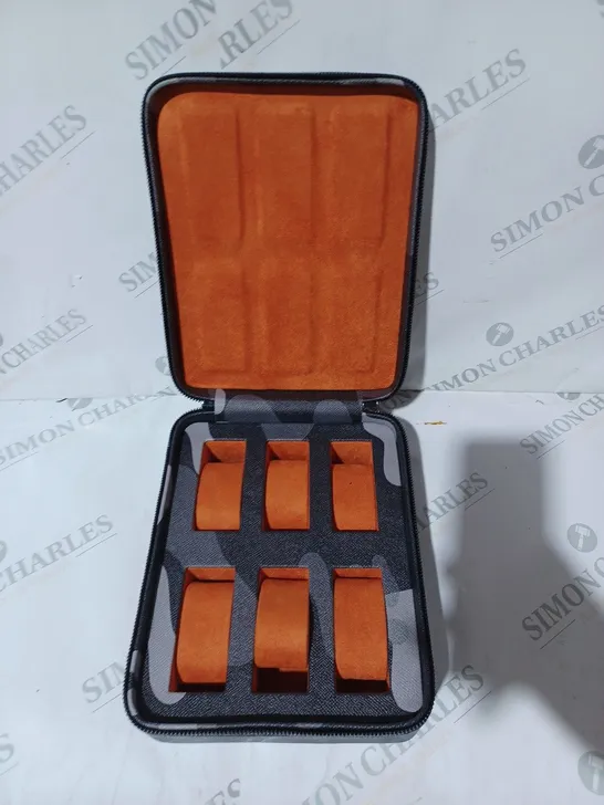 UNBRANDED WATCH STORAGE CASE IN URBAN CAMO PATTERN W. ORANGE INTERIOR