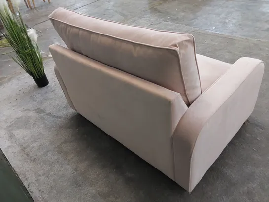 THE DUNSMORE LOVE SEAT SOFA BED UPHOLSTERED IN PETAL PINK FABRIC 