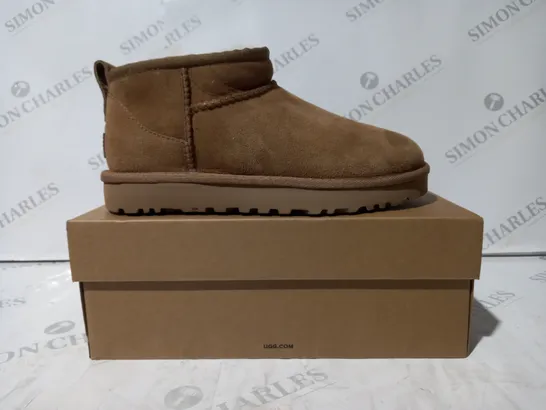 BOXED PAIR OF UGG CLASSIC ULTRA MINI SHOES IN TAN UK SIZE 4