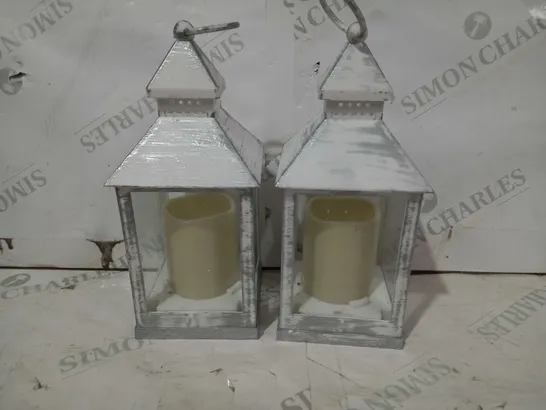 ASTIN OF LONDON PAIR OF CANDLE LANTERNS IN RUSTIC WHITE