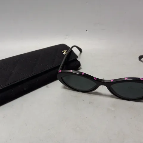 CHANEL OVAL FRAMED SUNGLASSES IN BLACK