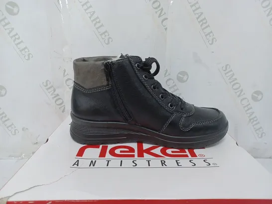 BOXED PAIR OF RIEKER WATER RESISTANT BOOTS IN BLACK SIZE 5