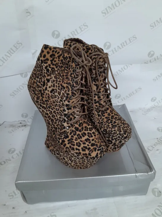 BOXED PAIR OF CASANDRA PLATFORM LACE UP BOOT IN LEOPARD SUEDE SIZE 3