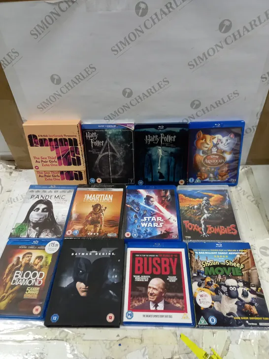 LOT OF APPROX 20 DVD'S TO INCLUDE HARRY POTTER, BATMAN BEGINS AND STAR WARS