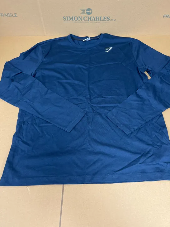 GYMSHARK LONG SLEEVED TOP IN NAVY SIZE MEDIUM