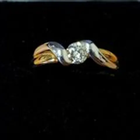 18CT GOLD TWIST RING SET WITH A NATURAL DIAMOND 