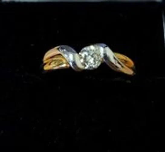 18CT GOLD TWIST RING SET WITH A NATURAL DIAMOND 