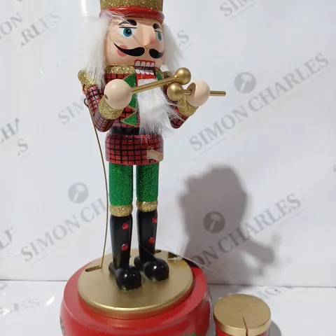 BOXED FESTIVE 32CM WOODEN ANIMATED MUSICAL NUTCRACKER