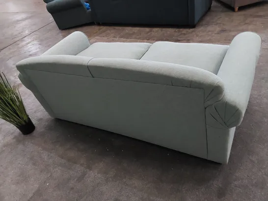 THE CHILMARK 3-SEATER SOFA UPHOLSTERED IN AQUA FABRIC