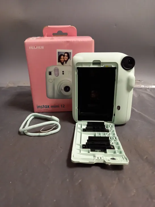 BOXED FUJIFILM INSTAX MINI 12 CAMERA IN MINT GREEN