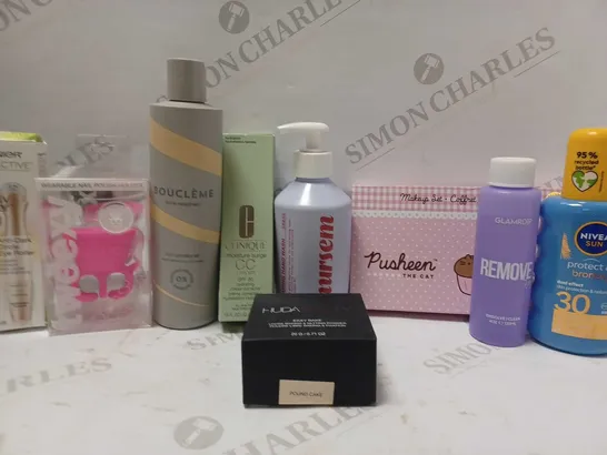 LOT OF APPROX 9 ASSORTED BEAUTY PRODUCTS TO INCLUDE BOUCLEME CURL CONDITIONER, CLINIQUE MOISTURE SURGE CC CREAM, HUDA BEAUTY EASY BAKE #POUNDCAKE, ETC 