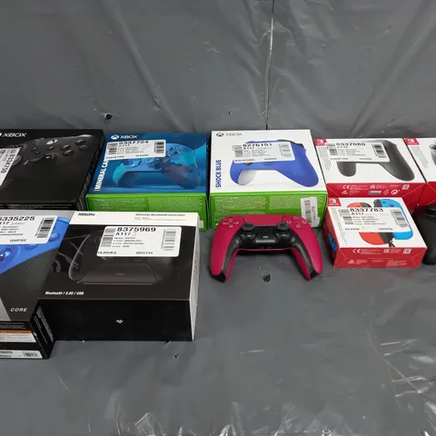 BOX OF APPROXIMATELY 10 ASSORTED GAMES CONTROLLERS TO INCLUDE NINTENDO, PLAYSTATION AND XBOX