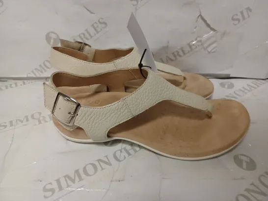 PAIR OF VIONICA STRAP-UP SANDALS IN CREAM - SIZE 6