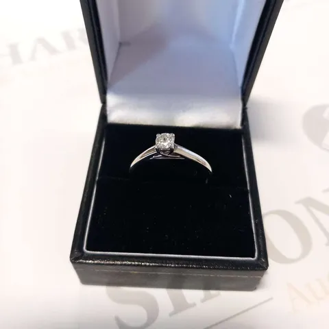9CT WHITE GOLD SOLITAIRE RING SET WITH A NATURAL DIAMOND